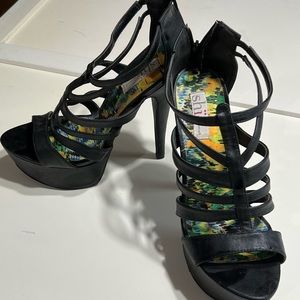Black shi stiletto pumps